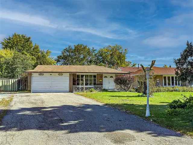 5 Bedroom Home with 2 Kitchens and 6 Car Driveway in Sought After Neighborhood