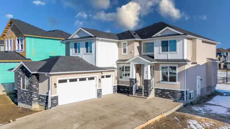 Buy Detached Home in Okotoks with Spacious Layout and Modern Upgrades