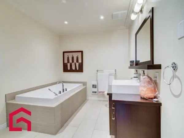 Bi-level Condo near Mont St-Sauveur with Lake Views