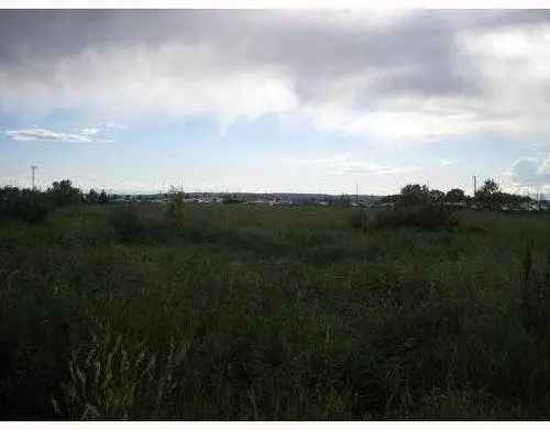 Buy Vacant Land in Calgary Alberta with High Investment Potential