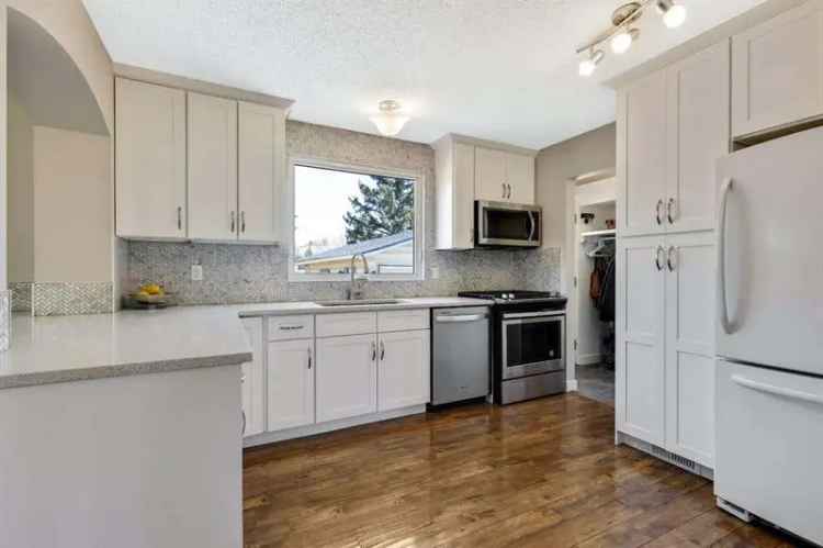 Affordable Glenbow Detached Home with Double Garage and Workshop