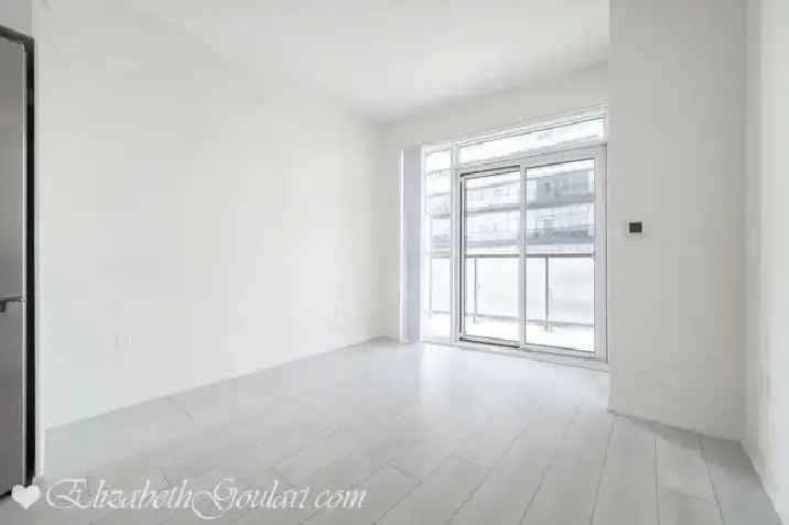 Water's Edge Condo: 1 Bedroom Den with Parking