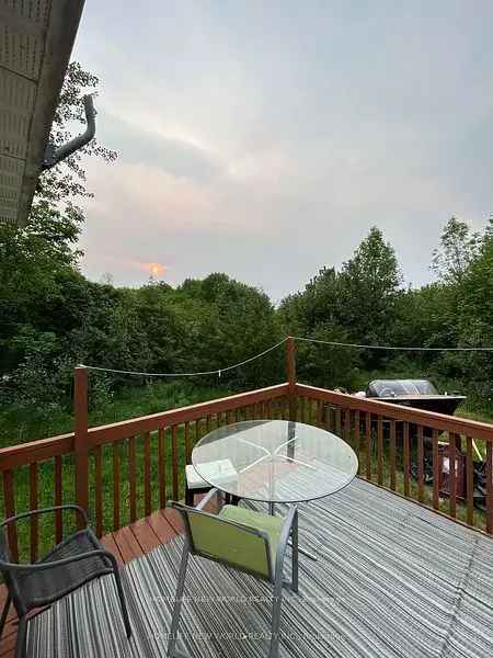 Rent Raised Bungalow Near Sable Beach with Sauna and Fire Pit