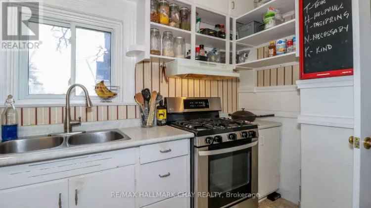 Charming Family Home with Galley Kitchen and Large Backyard