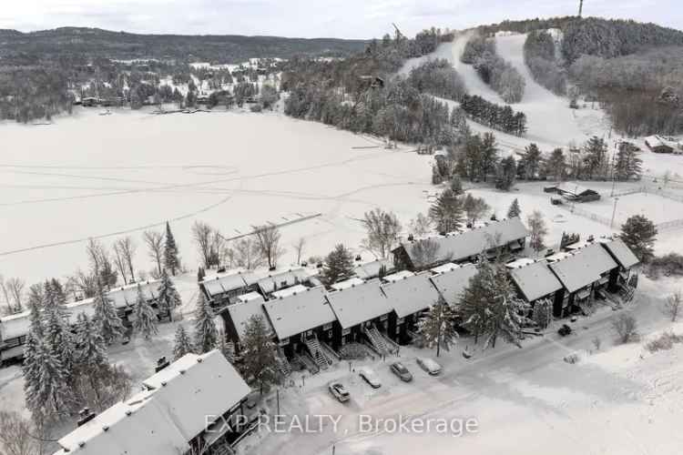 Buy Stylish Condo Townhouse in Hidden Valley with Scenic Lake Views