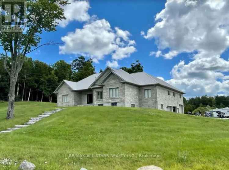 47-Acre Custom Bungalow in Uxbridge with Huge Shop and Garage