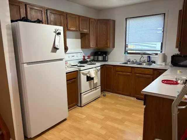 Lethbridge Revenue Property with Double Driveway and Private Backyard