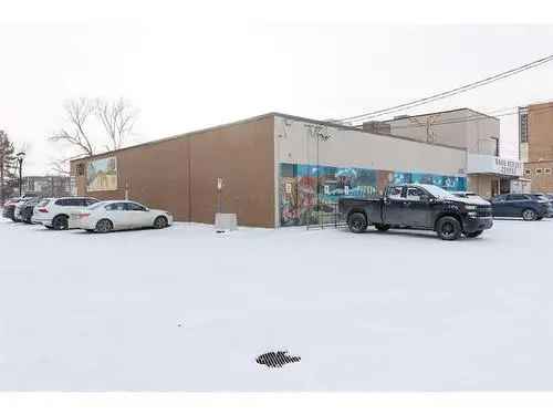 Buy Commercial Property in Downtown Red Deer with Parking and Visibility