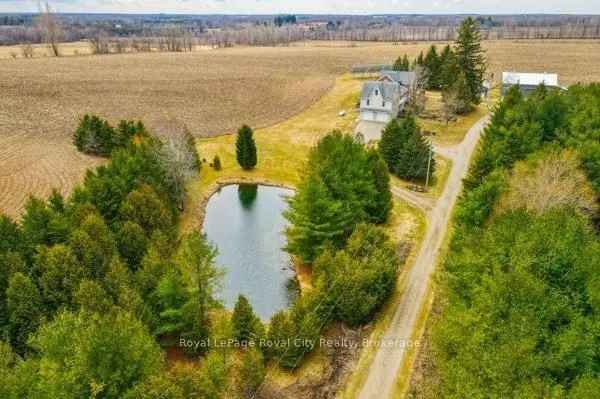 86 Acre Country Property with Multi-Generational Home and Outbuildings