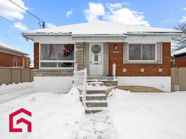 Bungalow for Sale in Longueuil with Detached Double Garage