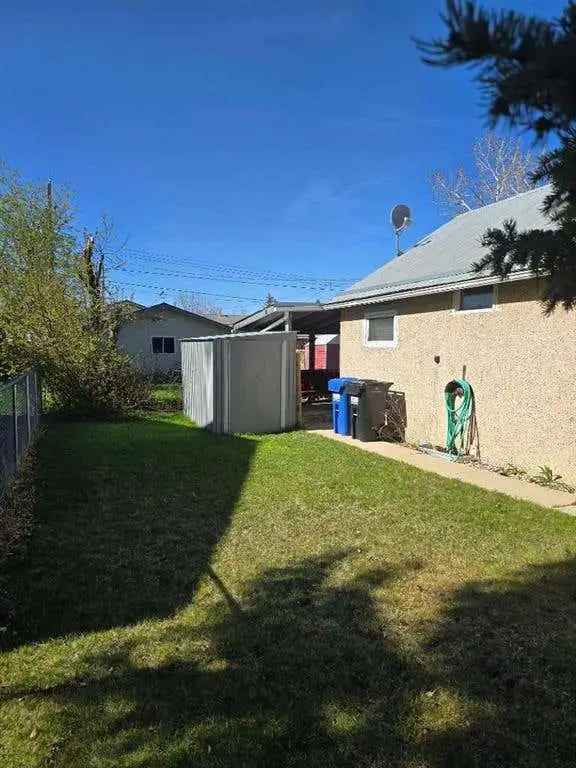 Charming Nanton Bungalow with Heated Double Garage