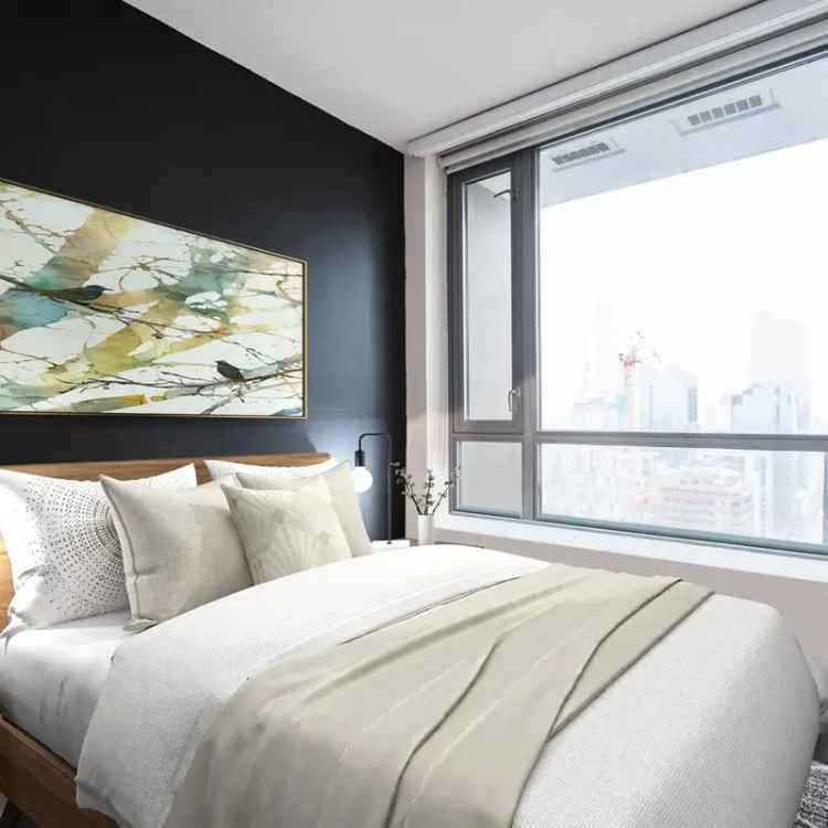 Sale of a 1 Bedroom Den Condo with City Views in the Salt Building