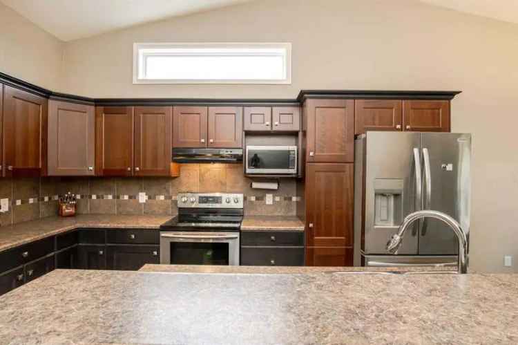 Family Home in Cobblestone with Finished Basement and Covered Patio