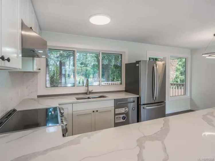 Beautifully Renovated 4 Bed 3 Bath Home with Development Potential