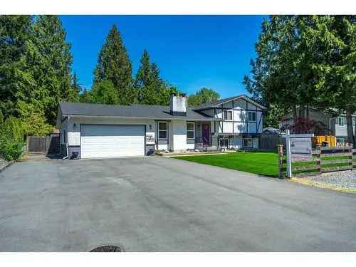 Updated 3-4 Bedroom Home in Langley with Huge Yard and Double Garage