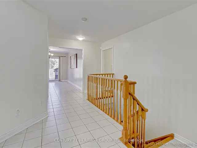 Spacious 3-Bedroom Main Floor Unit Backing Onto Ravine