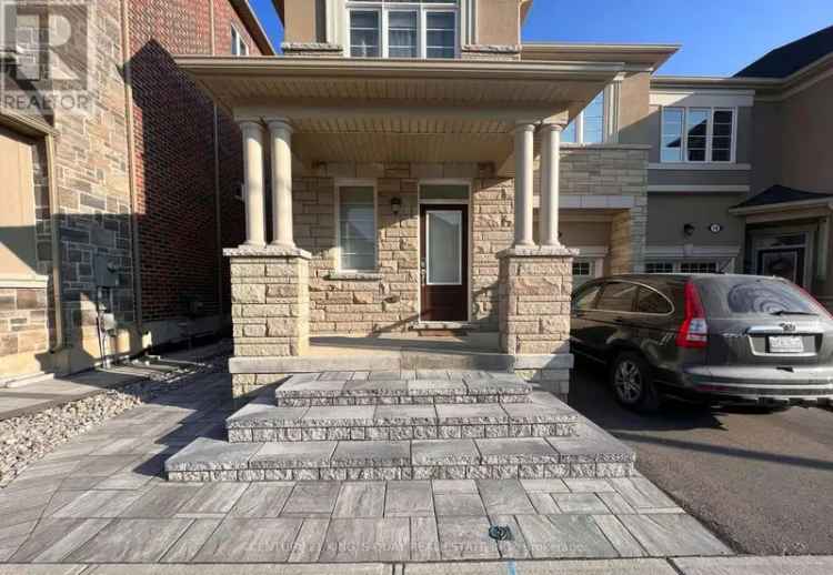 End Unit Freehold Townhome Loaded with Upgrades