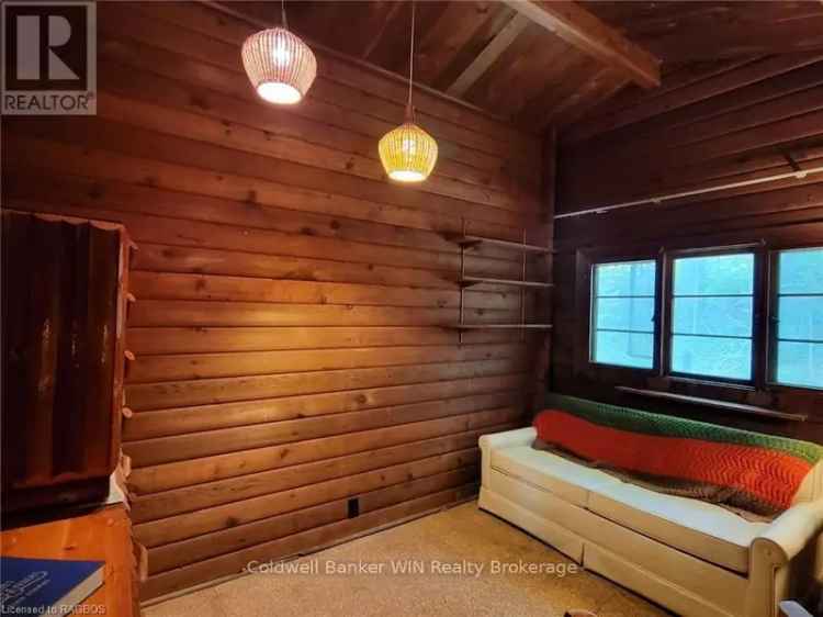 19 Acre Lakefront Property with Home and Workshop