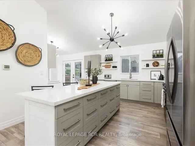 Beautifully Renovated Bungalow on Acre Lot with 3-Car Garage & Workshop