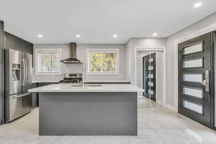 Fully Renovated Bungalow with Legal Basement and Inground Pool