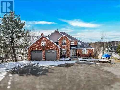 Elegant 3 Story Brick Home on 17 Acres with Lake Views