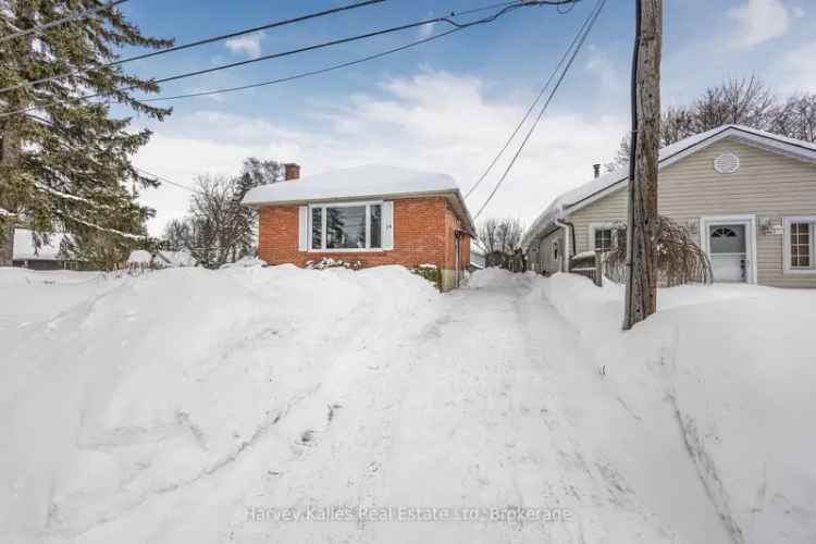 Buy bungalow in Wasaga Beach with upgrades and near beach access