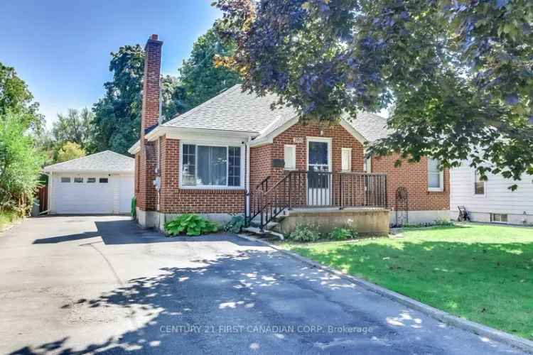 Buy 3 Bedroom Bungalow with Finished Basement and Park-Like Yard