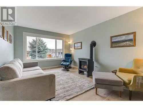 Buy House in Glenmore Clifton Dilworth Kelowna with Legal Suite