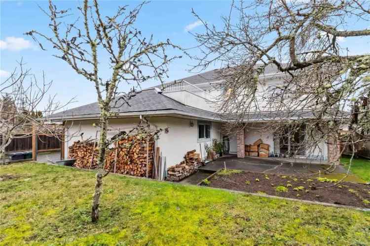 Buy Custom Built House with Ocean Views in Arbutus Neighborhood