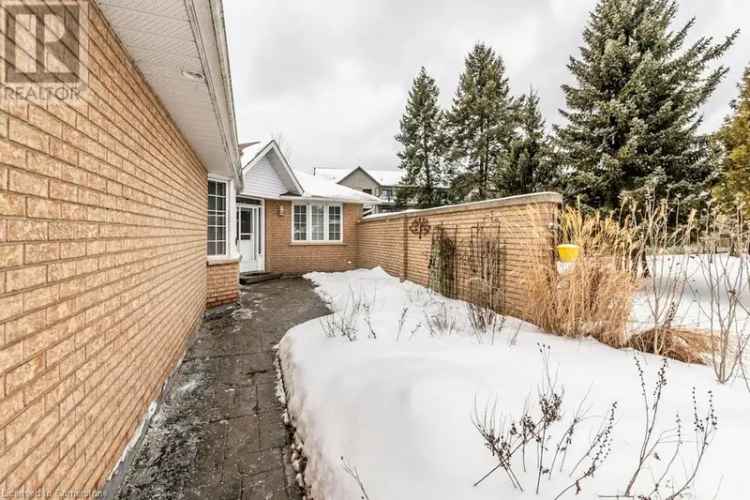 All Brick Bungalow Condo with Double Garage and Finished Basement