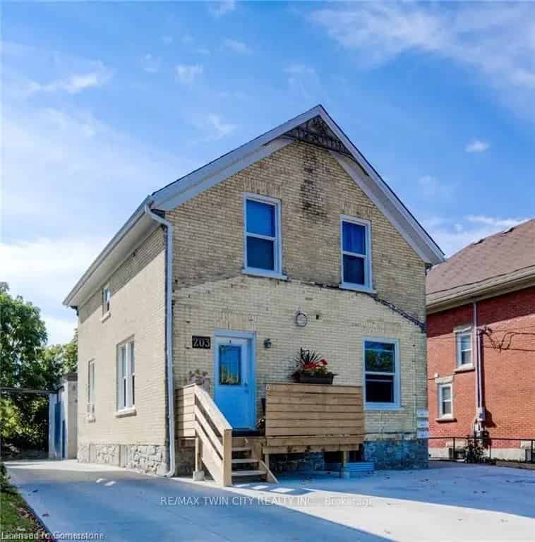 Yellow Brick Home with 2 Kitchens and Workshop