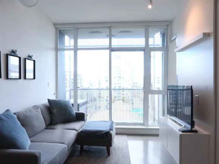 Vancouver Olympic Village 1-Bed Condo with Den and EV Parking