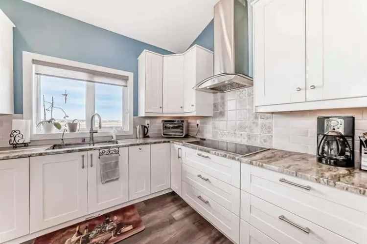 5 Bedroom 3 Bathroom Modified Bi Level Home with Pond View