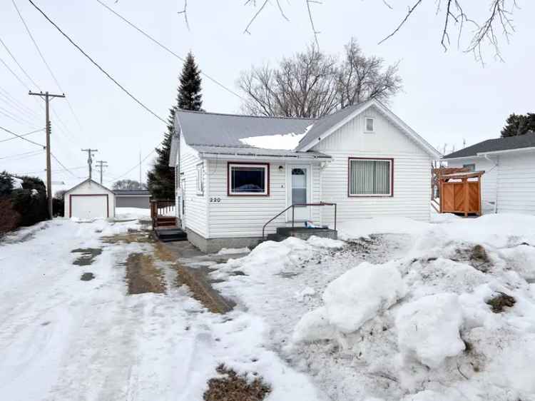 Buy Bungalow in Manitou with Backyard and Garage