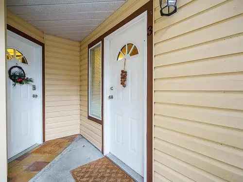 Buy townhouse in Douglas Langley with modern features and patios