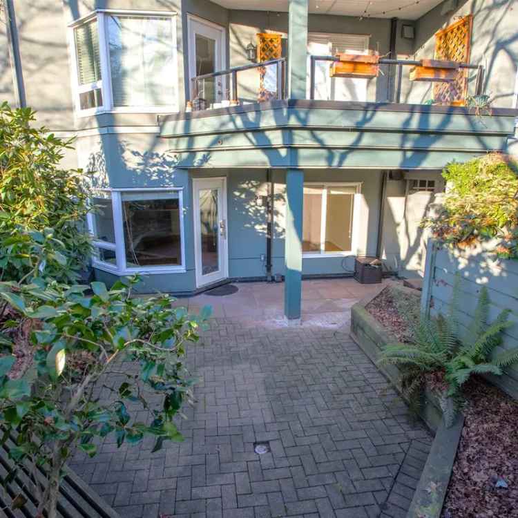 For Sale Ground-Level Condo in Kitsilano with Private Yard and Modern Features