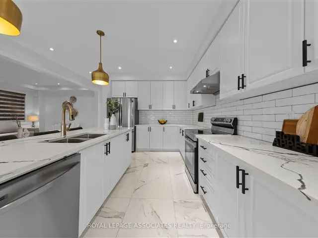 Stunning 4-Bedroom 5-Bathroom Modern Home on Ravine Lot