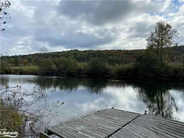 Waterfront Lot with Damaged Cottage - Great Potential