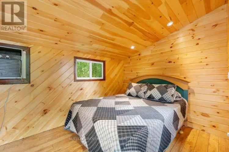Moira Lake Waterfront Home with Bunkies and Boathouse