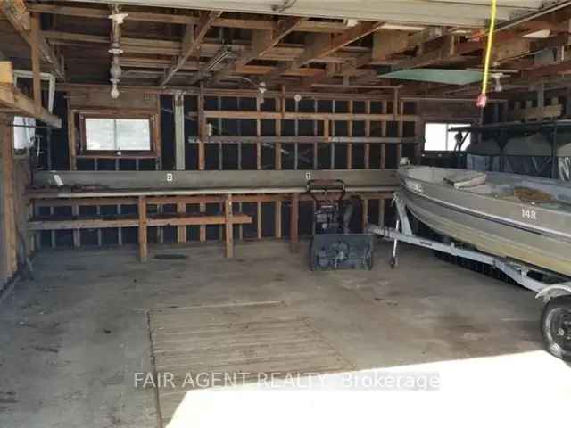 Half Acre Lot with Garage Workshop Harty Ontario