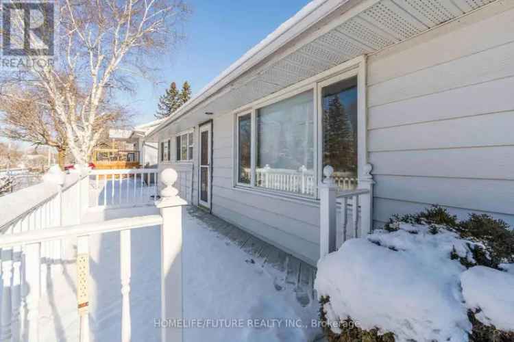 Buy Bungalow in Charming Location with Backyard and Sunroom