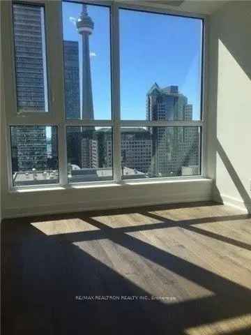 Downtown Toronto 1 Bedroom + Den Condo with Unobstructed South Views