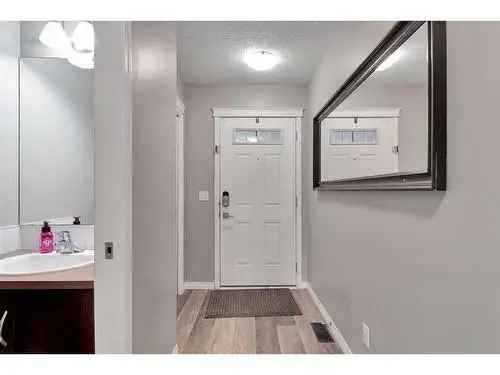 Townhouse for Sale in Chaparral Calgary with Modern Design and Outdoor Access