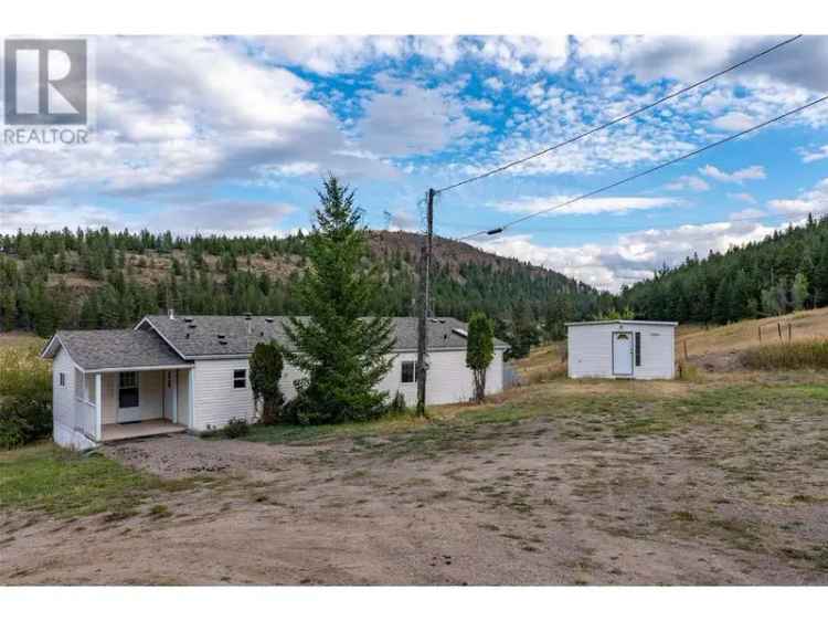 Buy House in Kamloops with Stunning Mountain Views and Rural Charm