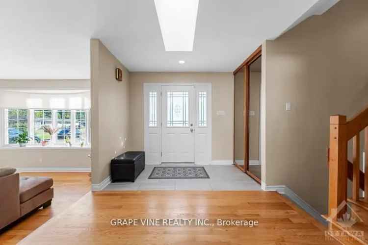 Spacious Side Split Bungalow on 1.07 Acres with Double Garage