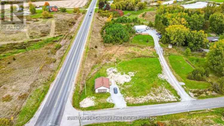 2.2-Acre Property with Renovated Bungalow and Heated Shop