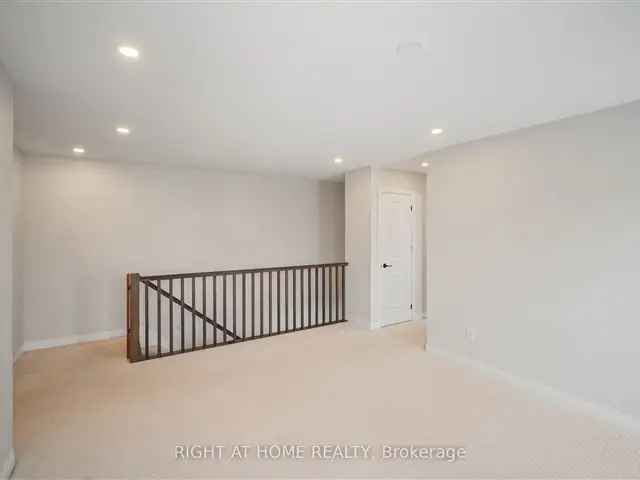 Buy 3 Bedroom Townhome in Barrhaven with Loft and Double Car Garage