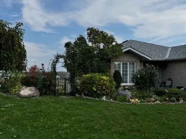 Custom Brick Bungalow with Walkouts and Finished Basement