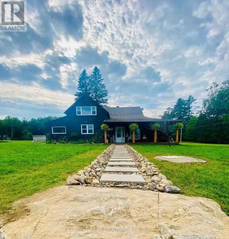 Beautifully Renovated Farmhouse on 25 Acres