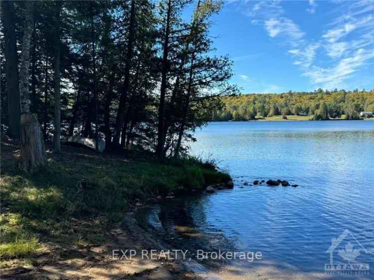 Rent waterfront cottage with private beach and fireplace on Lorwell Lake